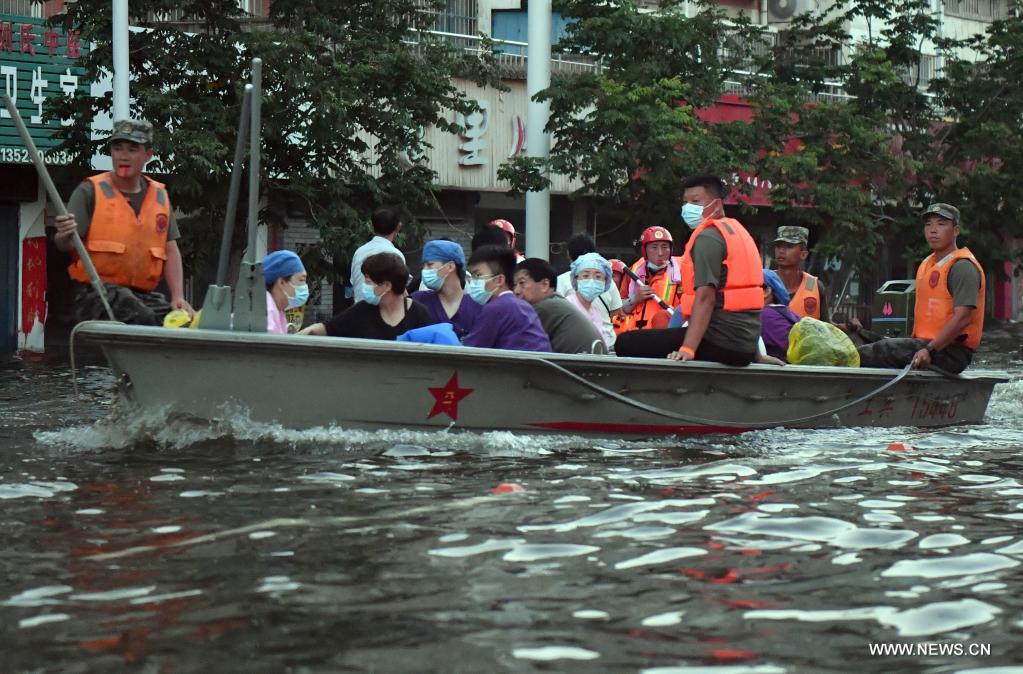 أعمال الإنقاذ من الفيضانات في مقاطعة خنان الصينية_fororder_02