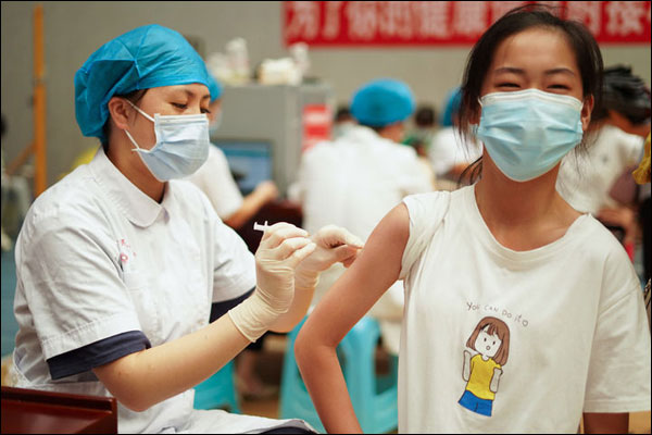 ทั่วประเทศจีนมีผู้รับวัคซีนโควิดแล้วเกิน 1,100 ล้านคน_fororder_20210920ymjz