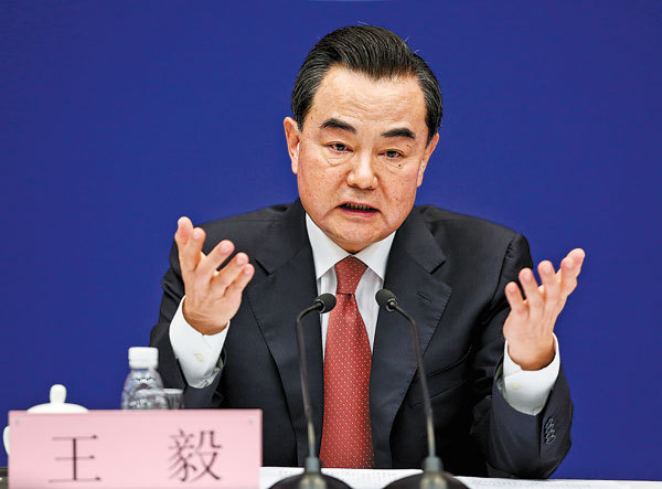 Foreign Minister Wang Yi tells reporters on Wednesday that BRICS members will focus on key economic areas. [Photo: China Daily]