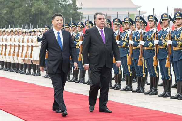 Chinese President Xi Jinping (L) views an honour guard with visiting President of Tajikistan Emomali Rahmon during a welcome ceremony before their talks in Beijing, capital of China, August 31, 2017. Rahmon is paying a state visit to China. During his stay in China, he will attend the Dialogue of Emerging Markets and Developing Countries held in Xiamen, a coastal city in southeast China's Fujian Province. [Photo: Xinhua/Li Tao]