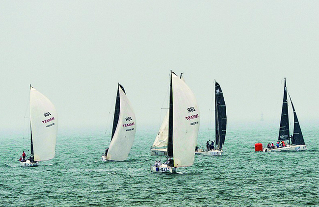 Sailing teams from all over the world compete during the 2017 Qingdao International Sailing Week • Ocean Festival. [Photo by Zhou Guanghui/Qingdao Today]