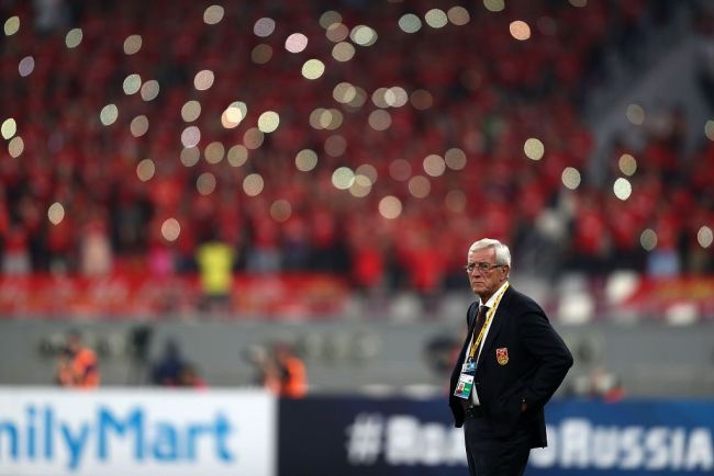 Marcello Lippi looks on during the FIFA World Cup 2018 qualification football match between Qatar and China on September 5, 2017. [Photo: VCG]