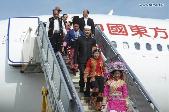 Delegates of Yunnan Province to the 19th National Congress of the Communist Party of China (CPC) arrive at Capital International Airport in Beijing, capital of China, Oct. 16, 2017. The congress will start on Oct. 18 in Beijing.  [Photo: Xinhua]