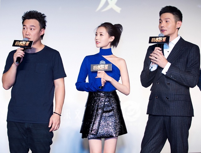 Hong Kong singer and actor Eason Chan (left), actress Li Yitong (center) and singer Li Ronghao (right) attend a promotional event in Beijing on Oct 18, 2017 for their upcoming movie "Keep Calm and Be A Superstar."[Photo: China Plus]