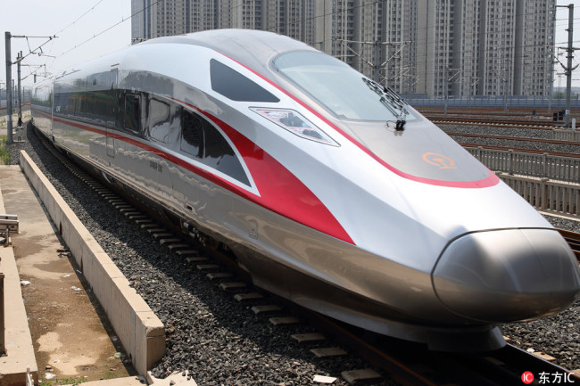 A "Fuxing" high speed bullet train on Beijing-Shanghai high speed railway line leaves the Ji'nan West Railway Station in Ji'nan city, east China's Shandong province, 26 June 2017.[Photo: IC]