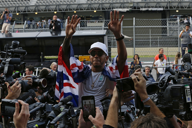 Mercedes driver Lewis Hamilton, of Britain, celebrates at the pit lane after the Formula One Mexico Grand Prix auto race at the Hermanos Rodriguez racetrack in Mexico City, Sunday, Oct. 29, 2017. Hamilton won his fourth career Formula One season championship on Sunday with a ninth-place finish at the Mexican Grand Prix in a race won by Red Bull's Max Verstappen. [Photo: AP]