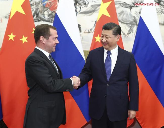 Chinese President Xi Jinping (R) meets with Russian Prime Minister Dmitry Medvedev in Beijing, capital of China, Nov. 1, 2017. [Photo: Xinhua/Xie Huanchi]