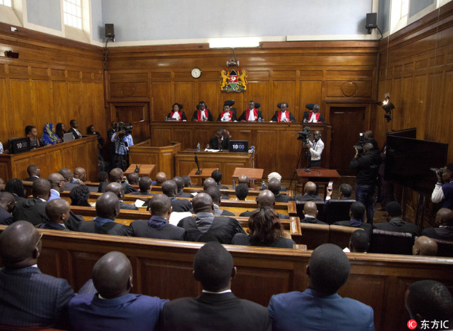 Kenyan Supreme Court judges preside during the judgement of the petitions at Supreme court in Nairobi, Kenya, Monday, Nov. 20, 2017.[Photo: IC] 