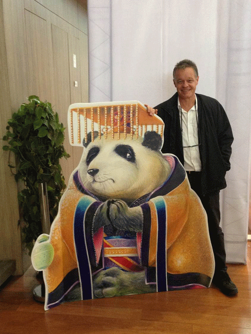 Many of Graeme's books contain imagines from Chinese symoblism and mythologgies, such as panda and dragon. [Photo:Courtesy of the Australian Embassy to China]