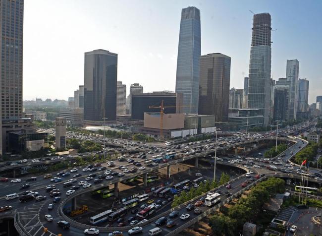 Vehicles line up during a traffic congestion in Beijing, on June 15, 2016.  [Photo: Xinhua]