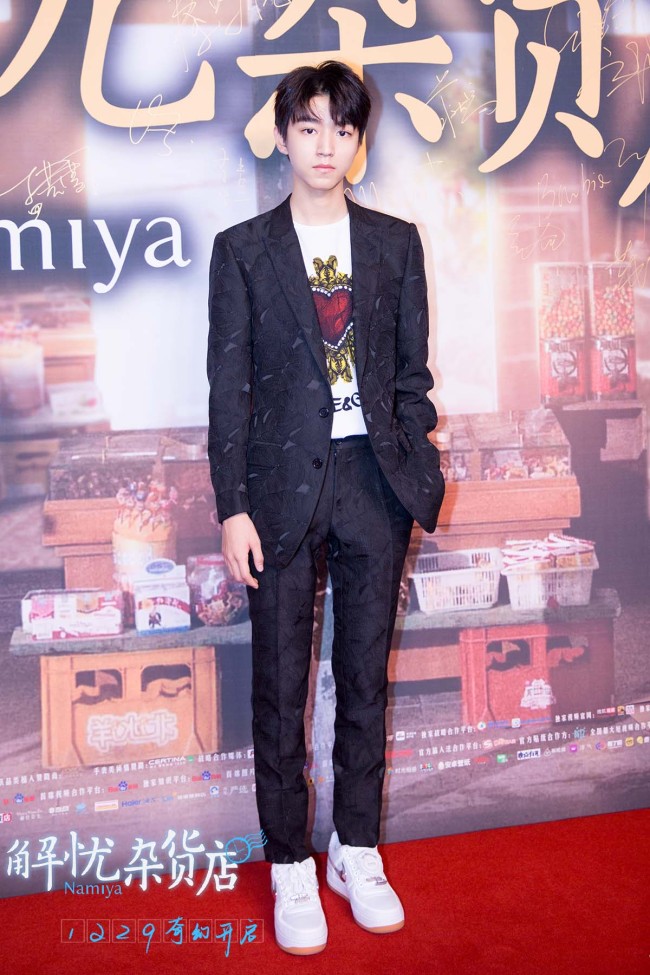 Actor Wang Junkai attends the premiere of his upcoming movie "Namiya"in Beijing on Thursday, Dec 21, 2017. [Photo: China Plus]