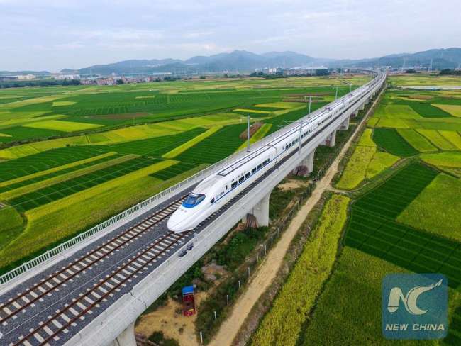 A high-speed train runs in Bose City, south China's Guangxi Zhuang Autonomous Region, July 22, 2016.[Photo: Xinhua]