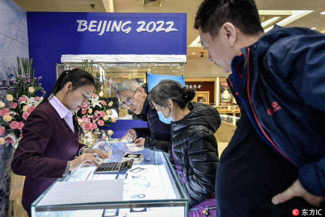 Customers visit stores on opening day to purchase Beijing 2022 Winter Olympics products. [Photo: IC]