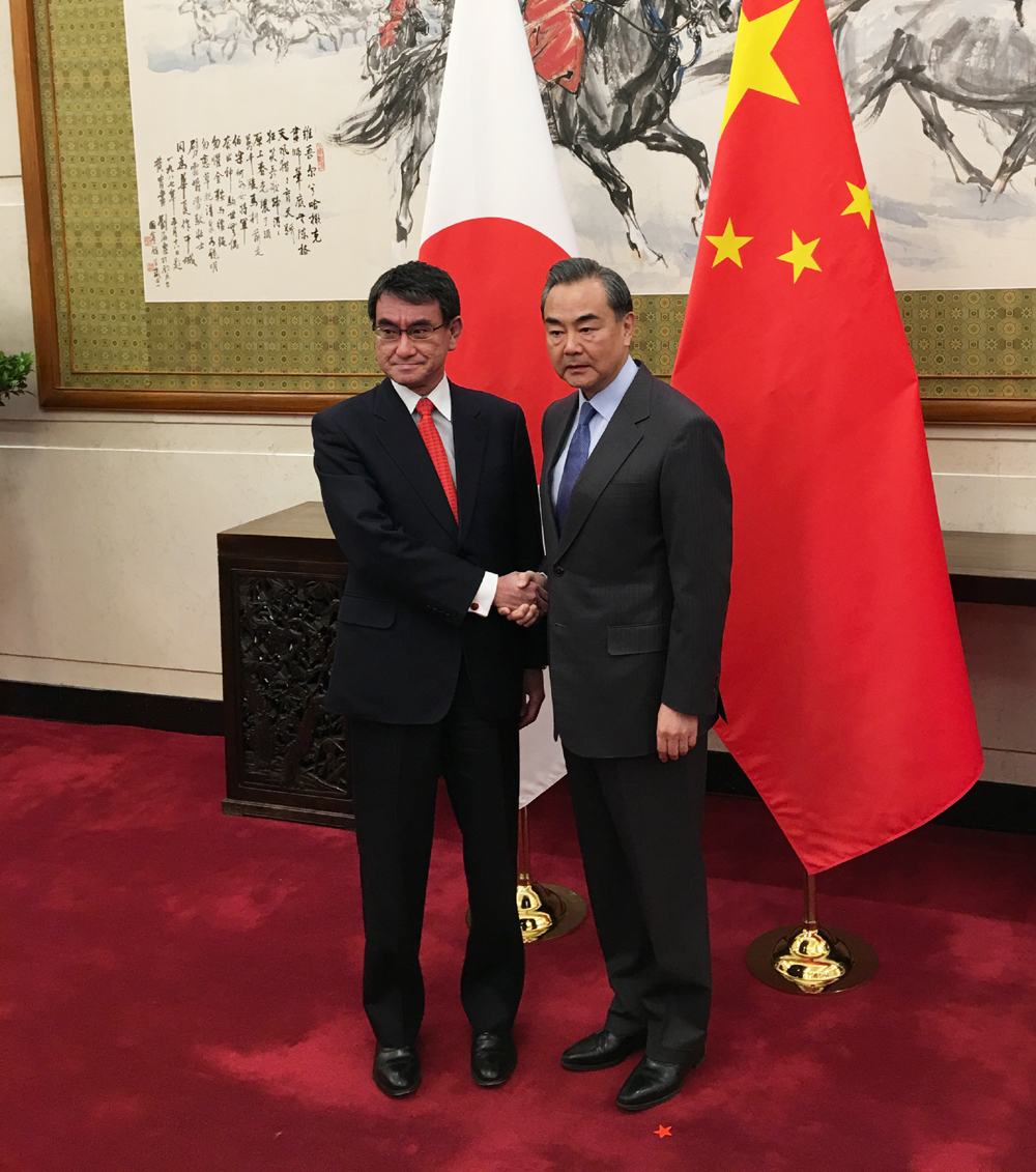 Chinese Foreign Minister Wang Yi (R) meets with his Japanese counterpart Taro Kono in Beijing on Sunday, January 28, 2018. [Photo: China Plus]