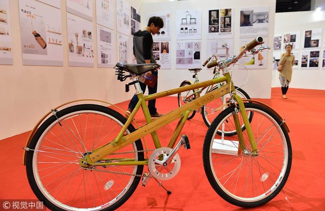 An environmentally-friendly bamboo bicycle is on display in the city of Yiwu, Zhejiang Province on Aprial 29, 2014. [File Photo: VCG]