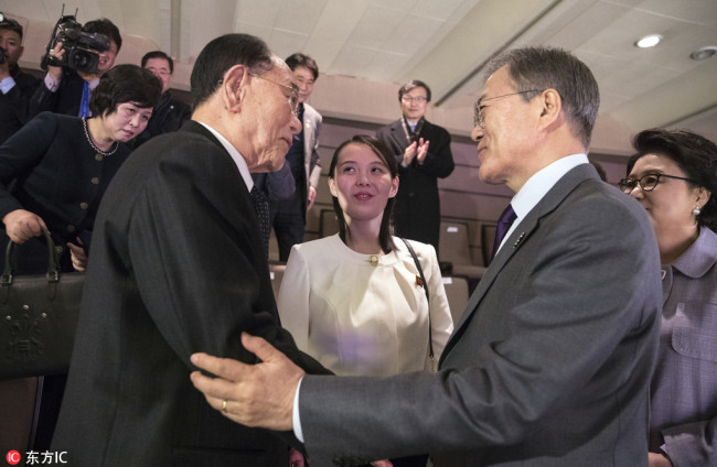 South Korean President Moon Jae-in talks with president of the Presidium of the Supreme People's Assembly of North Korea Kim Young Nam as Kim Yo Jong, the sister of North Korea's leader Kim Jong Un, looks on after North Korea's Samjiyon Orchestra's performance in Seoul, South Korea, February 11, 2018.[Photo: IC]