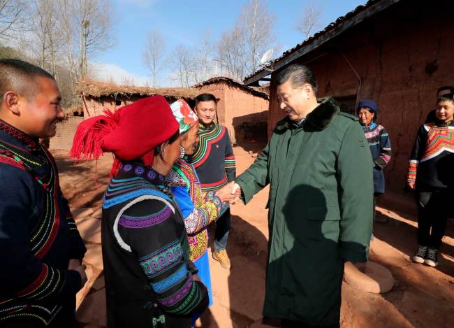 Xi Jinping, general secretary of the Communist Party of China Central Committee, visits villages in Zhaojue county, southwest China's Sichuan Province on Sunday, for poverty alleviation work. [Photo: Xinhua]
