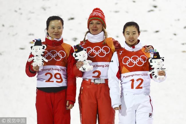 Zhang Xin (left) won the third silver for China at 2018 PyeongChang Olymic Games. [Photo: VCG]
