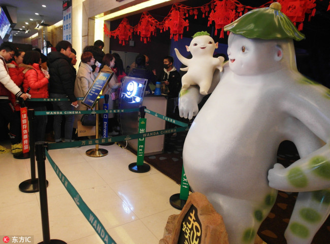 Chinese filmgoers queue up to buy tickets for "Monster Hunt 2" in Yichang, central China's Hubei province, Lunar New Year's Day, February 16, 2018. [Photo: IC]