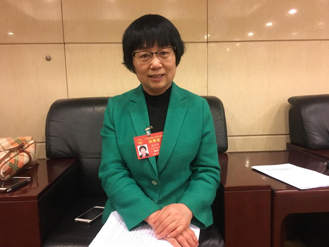 Zhu Guoping, a deputy to the Fifth Session of the 12th National People's Congress, is from east China's Shanghai. [Photo: China Plus/Sun Yang]