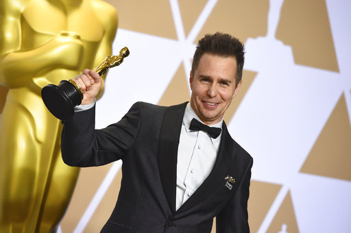 Sam Rockwell, winner of the award for best performance by an actor in a supporting role for "Three Billboards Outside Ebbing, Missouri", poses in the press room at the Oscars on Sunday, March 4, 2018, at the Dolby Theatre in Los Angeles. [Photo: AP]