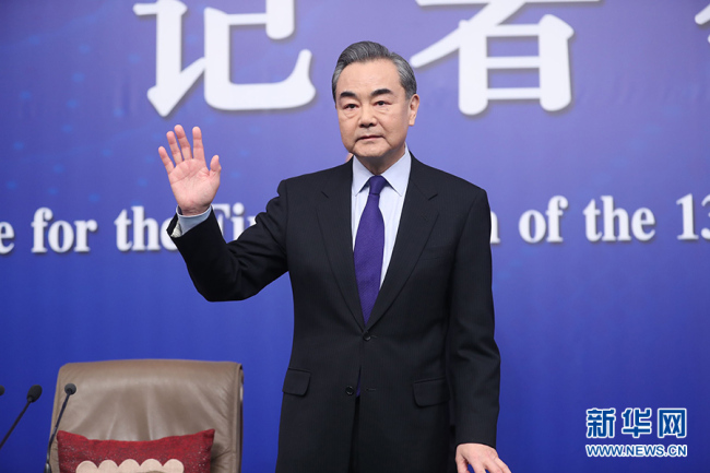 Chinese Foreign Minister Wang Yi meets the press in Beijing, on March 8, 2018. [Photo: Xinhua]