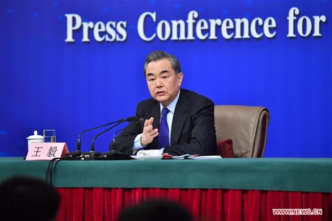 Chinese Foreign Minister Wang Yi answers questions on China's foreign policies and foreign relations at a press conference on the sidelines of the first session of the 13th National People's Congress in Beijing on March 8, 2018. [Photo: Xinhua/Li Xin]