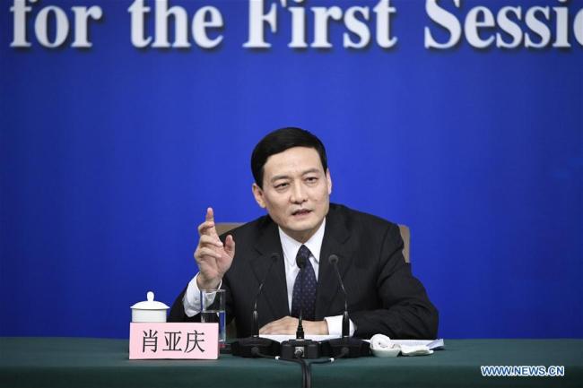 Xiao Yaqing, head of the State-owned Assets Supervision and Administration Commission (SASAC), answers questions at a press conference on reform and development of state-owned enterprises on the sidelines of the first session of the 13th National People's Congress in Beijing, capital of China, March 10, 2018. [Photo: Xinhua/Wang Peng]