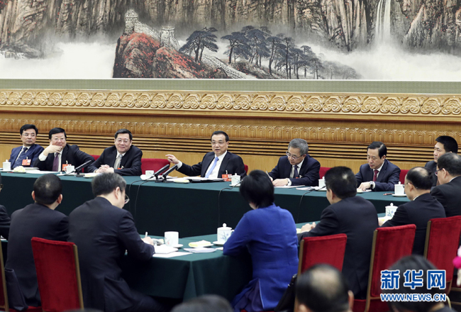 Senior Chinese leaders joined deputies in panel discussions on Monday at the first session of the 13th National People's Congress (NPC). [Photo: Xinhua]