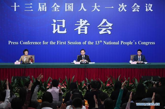 Chinese Minister of Environmental Protection Li Ganjie (C) takes questions at a press conference on the battle against pollution on the sidelines of the first session of the 13th National People's Congress (NPC) in Beijing, capital of China, March 17, 2018. [Photo: Xinhua]