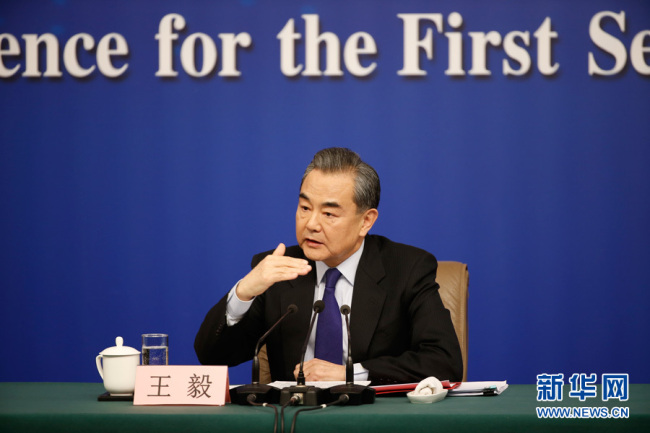 Chinese Foreign Minister Wang Yi answers questions on China's foreign policies and foreign relations at a press conference on the sidelines of the first session of the 13th National People's Congress in Beijing on March 8, 2018. [File Photo: Xinhua]
