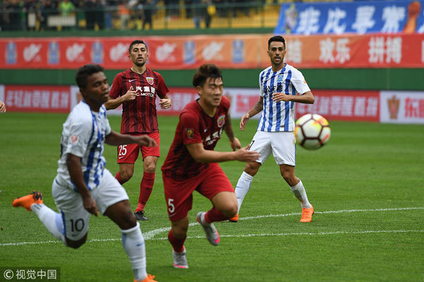 Shanghai SPIG defeats Guangzhou R&F 5-2 in the third round of the Chinese Super League (CSL) in Guangzhou, Guangdong Province, on March 18, 2018. [Photo: Imagine China]