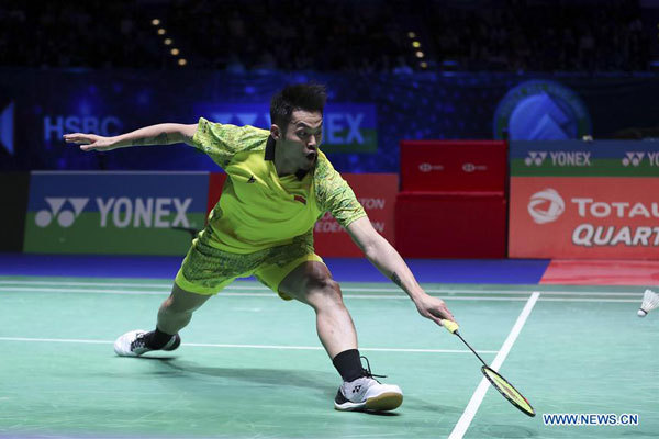 Lin Dan of China returns the shot during the men's singles final with his compatriot Shi Yuqi at All England Open Badminton Championships 2018 in Birmingham, Britain on March 18, 2018. [Photo: Xinhua/Han Yan]