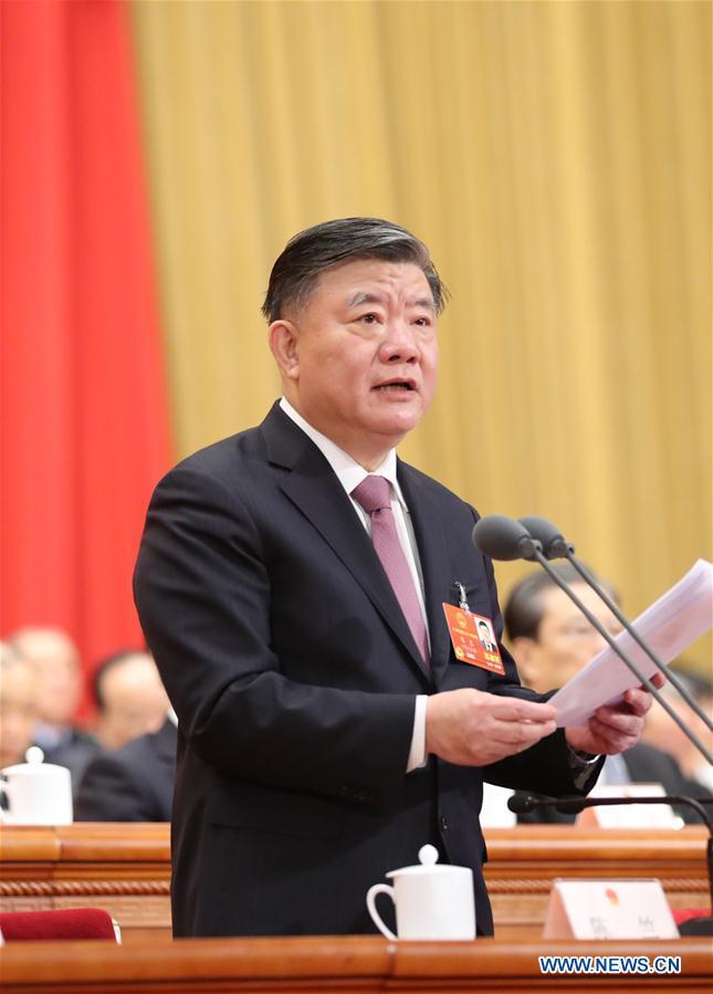 Chen Zhu presides over the seventh plenary meeting of the first session of the 13th National People's Congress (NPC) at the Great Hall of the People in Beijing, capital of China, March 19, 2018. [Photo: Xinhua]