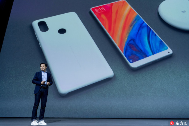 Lei Jun, Chairman and CEO of Xiaomi Technology and Chairman of Kingsoft Corp., introduces the Xiaomi Mi Mix 2S smartphone at the Xiaomi new products launch event in Shanghai, China, March 27 2018. [Photo: IC]