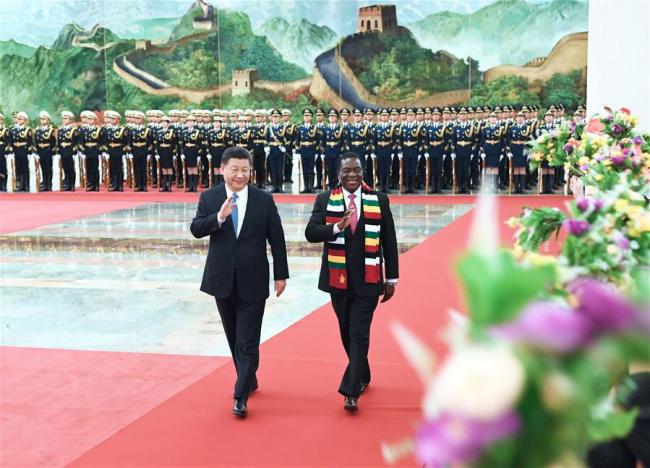Chinese President Xi Jinping holds a welcome ceremony for his Zimbabwean counterpart Emmerson Mnangagwa before their talks at the Great Hall of the People in Beijing, capital of China, April 3, 2018. [Photo: Xinhua/Rao Aimin]