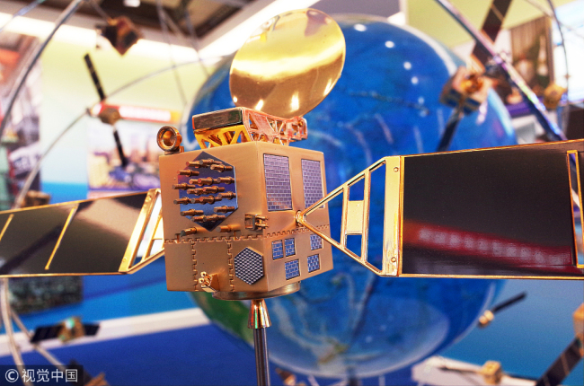 A model of the Beidou satellite navigation system on display during an exhibition in Beijing, September 26, 2017. [Photo: VCG]