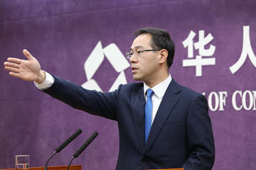 Ministry of Commerce spokesman Gao Feng speaks at a press briefing in Beijing on Thursday, April 12, 2018. [Photo: mofcom.gov.cn]