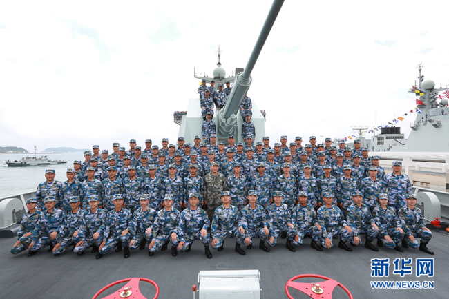 President Xi Jinping poses a group photo with the Chinese People's Liberation Army Navy in the South China Sea on April 12, 2018. [Photo: Xinhua]