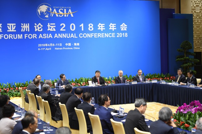 Chinese President Xi Jinping holds discussions with representatives of entrepreneurs from home and abroad, who gather here for the annual conference of the Boao Forum for Asia (BFA) in Boao, south China’s Hainan Province, April 11, 2018. [Photo: Xinhua]