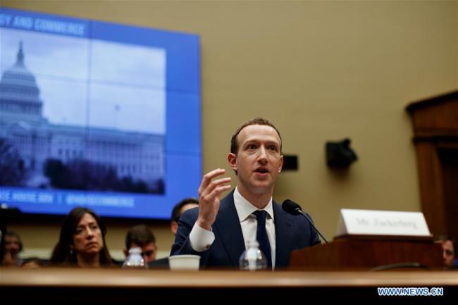 Facebook CEO Mark Zuckerberg (front) testifies before the House Energy and Commerce Committee on Capitol Hill in Washington D.C., the United States, on April 11, 2018. [Photo: Xinhua/Ting Shen]