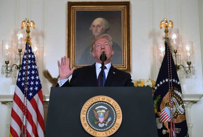 President Donald Trump speaks in the Diplomatic Reception Room of the White House on Friday, April 13, 2018, in Washington, about the United States' military response to Syria's chemical weapon attack on April 7. [Photo: AP/Susan Walsh]