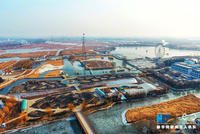 The aerial photo taken on Jan. 1, 2018 shows a view of Baiyangdian, one of the largest freshwater wetlands in north China, in Anxin County, north China's Hebei Province. China announced the plan for Xiongan New Area officially on April 1, 2017. The new area will span Xiongxian, Rongcheng and Anxin counties in Hebei Province, eventually covering 2,000 square kilometers. [Photo: Xinhua]