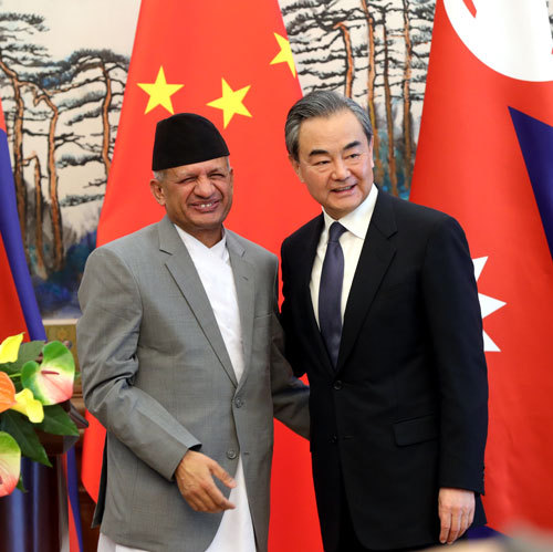 Chinese State Councilor and Foreign Minister Wang Yi meets with Foreign Minister of Nepal Pradeep Kumar Gyawali in Beijing on April 18, 2018. [Photo: Chinese Foreign Ministry]