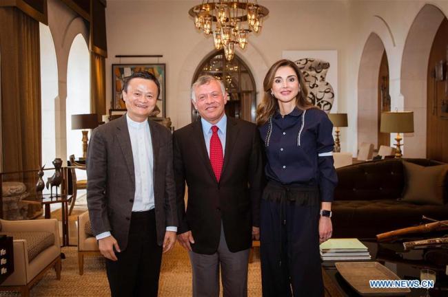 King Abdullah II of Jordan (C) and Queen Rania (R) meet with Jack Ma, founder and chairman of China's e-commerce giant Alibaba Group, at the King's Palace in Amman, Jordan, on May 7, 2018. King Abdullah II of Jordan on Monday received Jack Ma, the state-run Petra News Agency reported. [Photo: Xinhua]