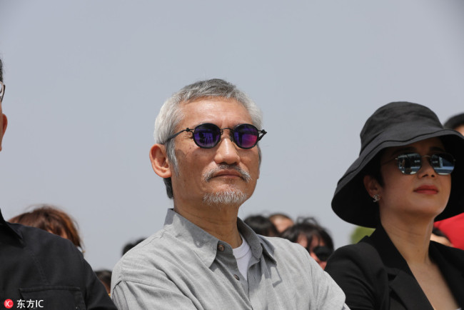 Chinese director Tsui Hark attends the groundbreaking ceremony for restoring historic buildings in Bengbu, East China's Anhui province, May 13, 2018. [Photo/IC]