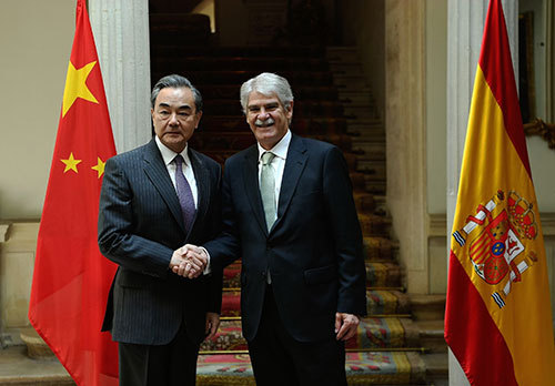 Chinese Foreign Minister Wang Yi meets with Spanish Foreign Affairs and Cooperation Minister Alfonso Dastis in Madrid, May 17, 2018. [Photo: fmprc.gov.cn]