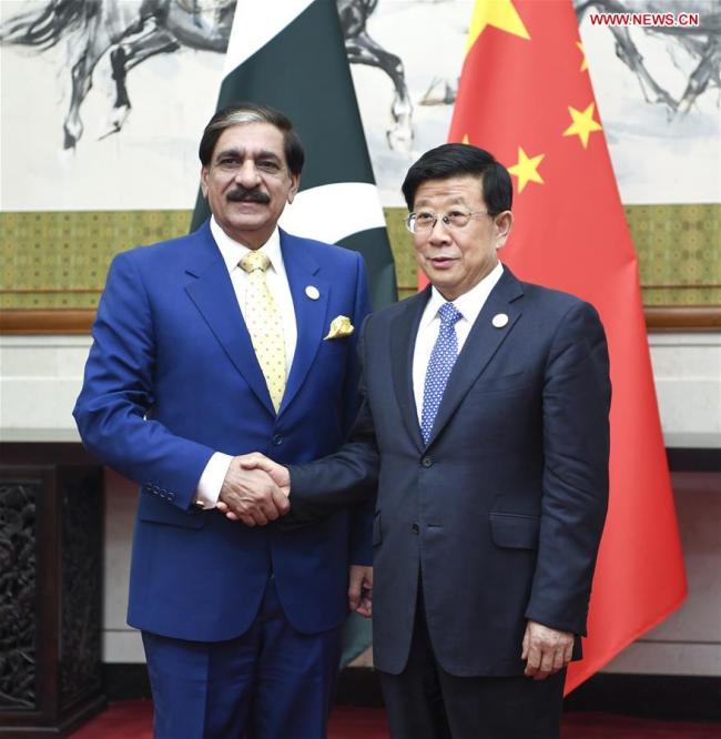 Chinese State Councilor and Minister of Public Security Zhao Kezhi (R) meets with Pakistan's National Security Adviser Naseer Khan Janjua, who is also head of a delegation attending the 13th meeting of Shanghai Cooperation Organization (SCO) Security Council Secretaries, in Beijing, capital of China, May 21, 2018. [Photo: Xinhua]