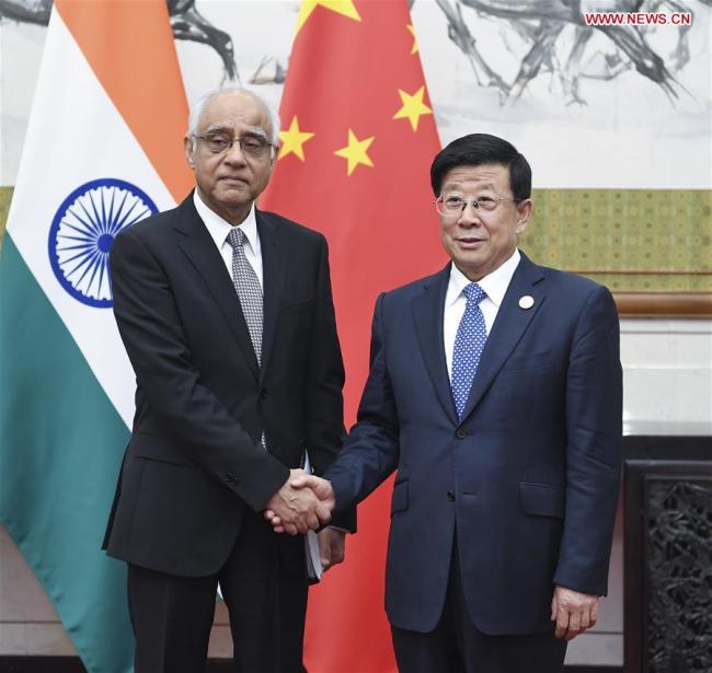 Chinese State Councilor and Minister of Public Security Zhao Kezhi (R) meets with Deputy National Security Adviser of India Rajinder Khanna, who is also head of a delegation attending the 13th meeting of Shanghai Cooperation Organization (SCO) Security Council Secretaries, in Beijing, capital of China, May 21, 2018. [Photo: Xinhua]