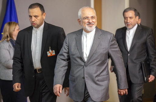 Iranian Foreign Minister Javad Zarif, center, leaves after a meeting with European Union foreign policy chief Federica Mogherini at the Europa building in Brussels on Tuesday, May 15, 2018. [Photo: AP]